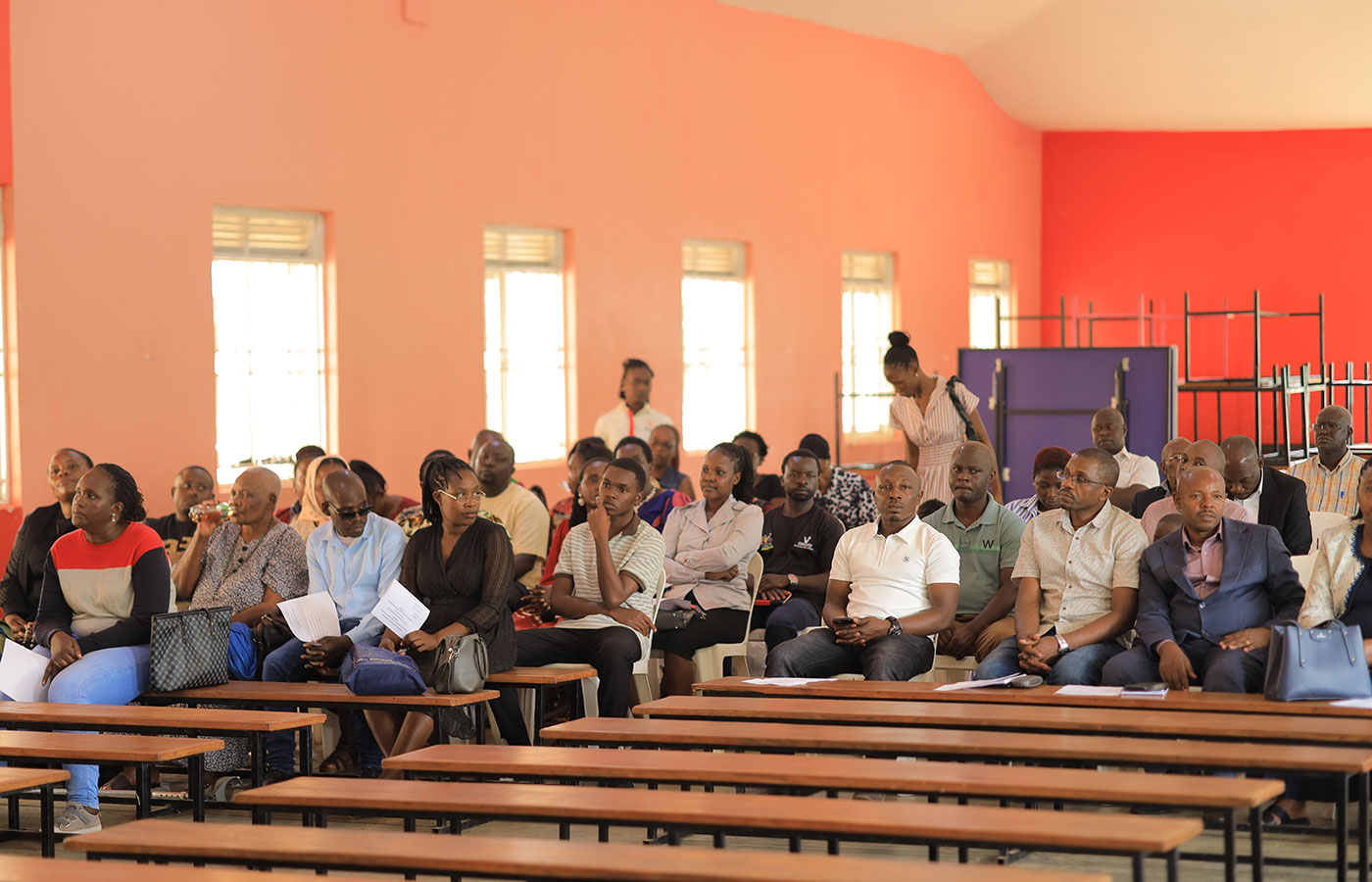 Parents attending a meeting at school